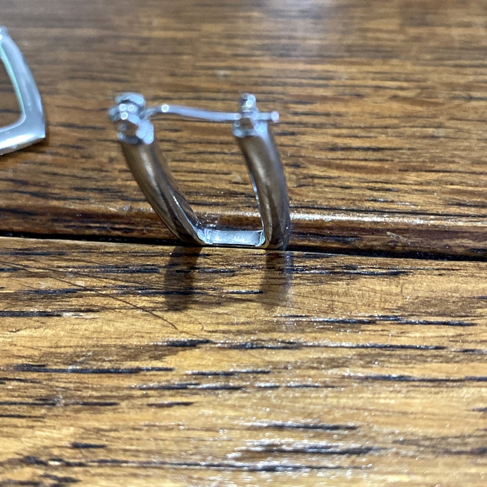 Silver 1.5 in rectangle pierced earrings. Very secure and light. They are pretty - Picture 3 of 12